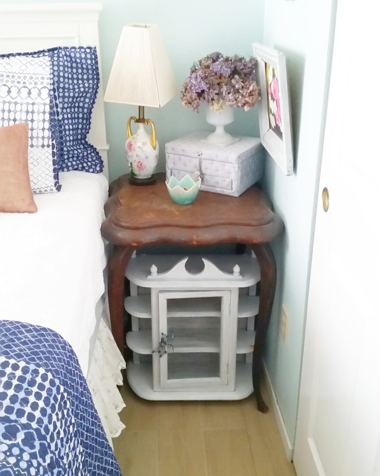 My great grandmother's little oak table. Just look at those pretty cabriole legs.